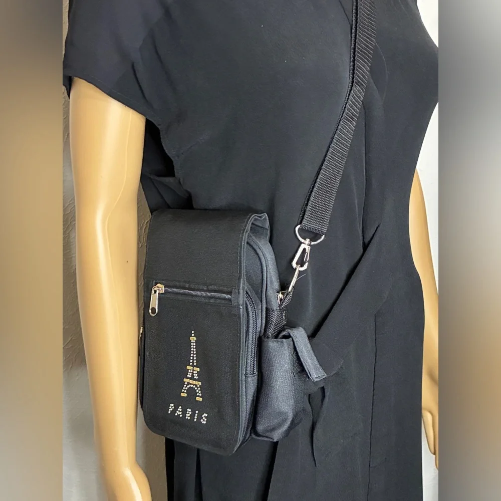 Petit Crossbody with Paris Bling. 3 Zippered pockets. 32” + detachable strap